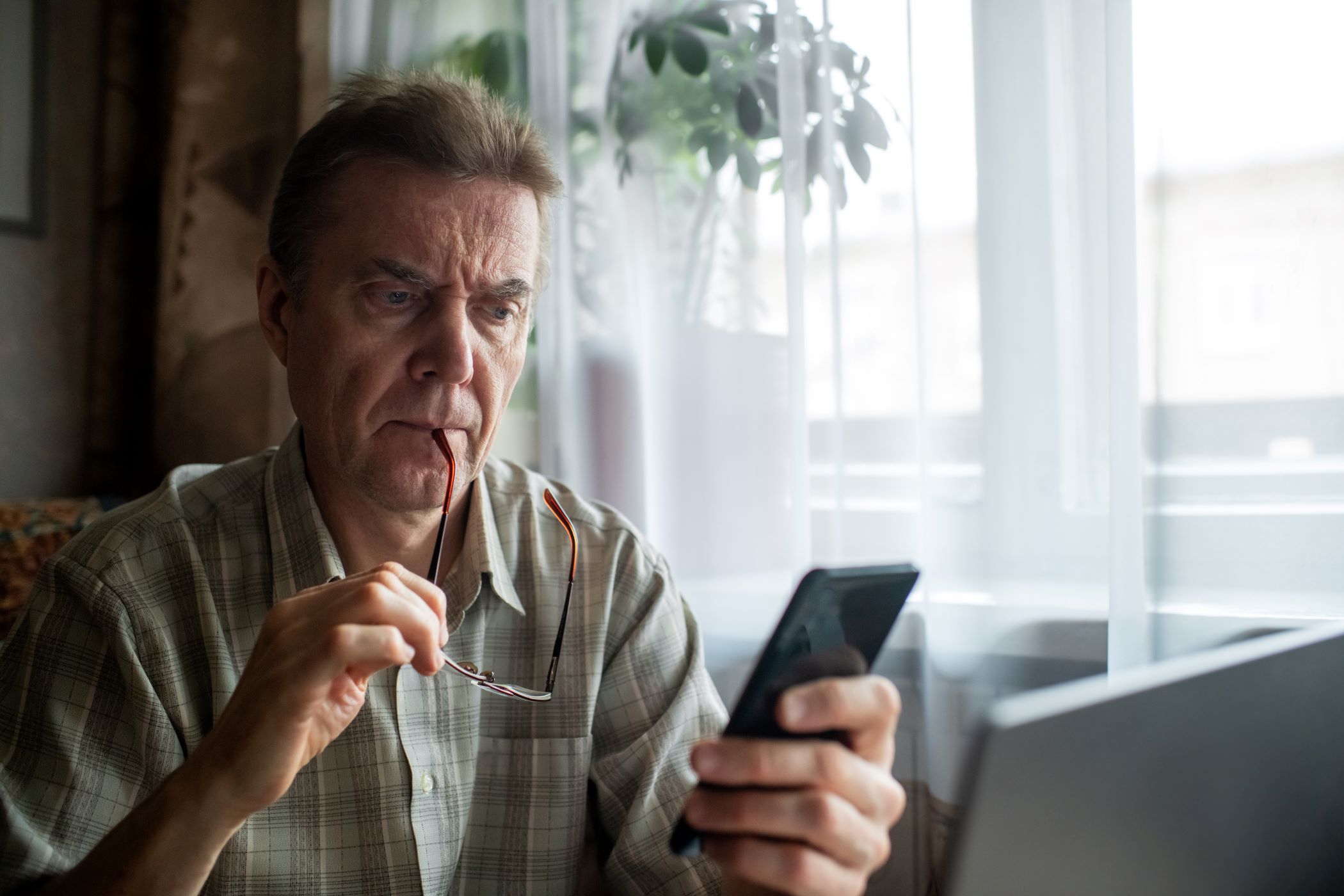 Man reviewing statement